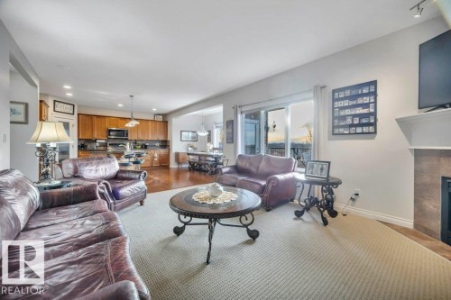 827 Southfork Green, Leduc, AB - Indoor Photo Showing Living Room With Fireplace