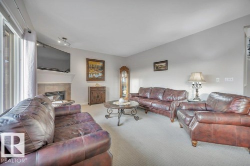 827 Southfork Green, Leduc, AB - Indoor Photo Showing Living Room With Fireplace