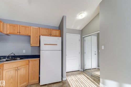 409 151 Edwards Drive Sw, Edmonton, AB - Indoor Photo Showing Kitchen With Double Sink