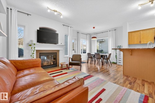 1954 119A Street, Edmonton, AB - Indoor Photo Showing Living Room With Fireplace