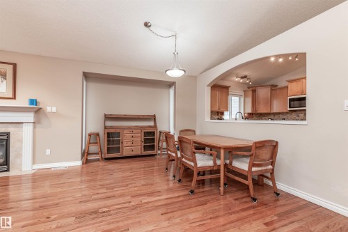 33 Eldorado Drive, St. Albert, AB - Indoor Photo Showing Dining Room With Fireplace