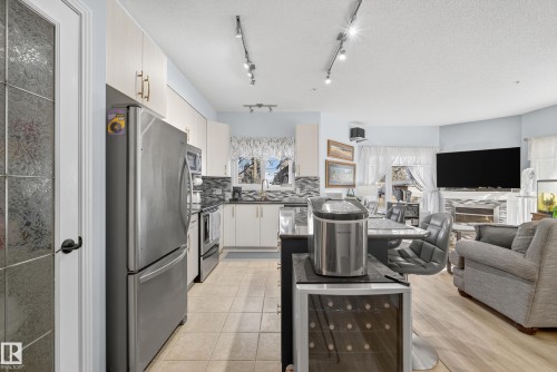 106 8931 156 Street, Edmonton, AB - Indoor With Fireplace