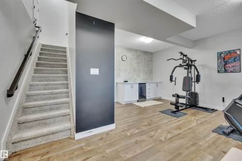 9246 90 Street, Edmonton, AB - Indoor Photo Showing Gym Room