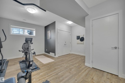 9246 90 Street, Edmonton, AB - Indoor Photo Showing Gym Room