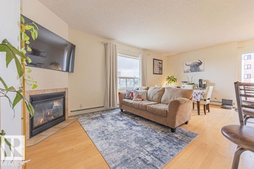 9707 105 Street, Edmonton, AB - Indoor Photo Showing Living Room With Fireplace