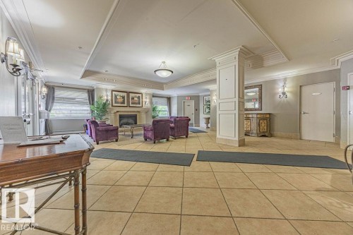 9707 105 Street, Edmonton, AB - Indoor Photo Showing Other Room With Fireplace