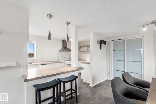 102 3510 Ste. Anne Trail, Rural Lac Ste. Anne County, AB - Indoor Photo Showing Kitchen