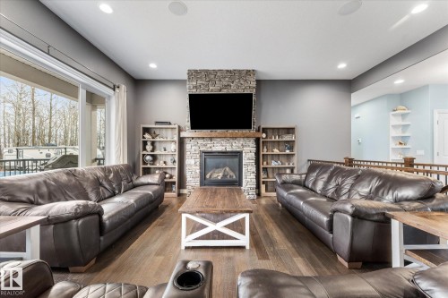 102 3510 Ste. Anne Trail, Rural Lac Ste. Anne County, AB - Indoor Photo Showing Living Room With Fireplace