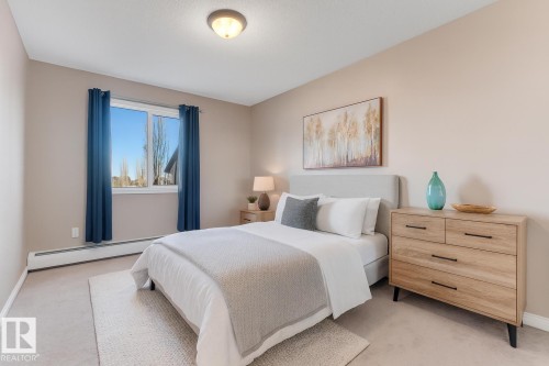 430 111 Edwards Drive, Edmonton, AB - Indoor Photo Showing Bedroom