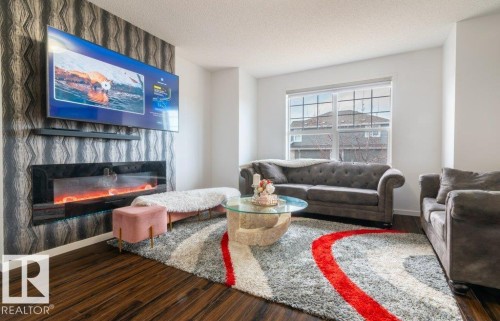 2031 52 Street Sw, Edmonton, AB - Indoor Photo Showing Living Room With Fireplace