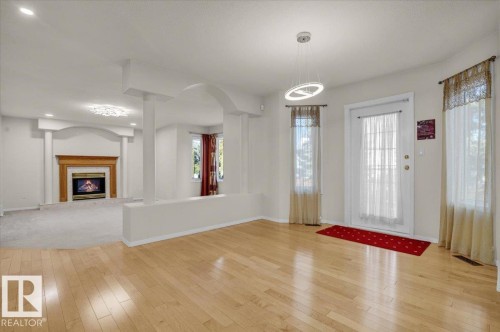 3676 30 Street, Edmonton, AB - Indoor Photo Showing Other Room With Fireplace