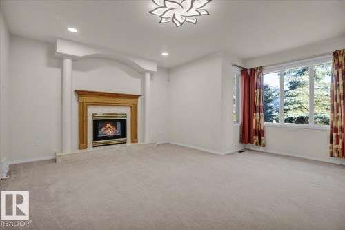 3676 30 Street, Edmonton, AB - Indoor With Fireplace