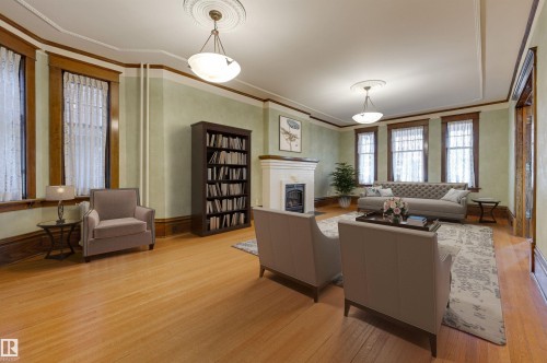 10317 Villa Avenue, Edmonton, AB - Indoor Photo Showing Living Room With Fireplace