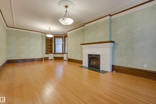 10317 Villa Avenue, Edmonton, AB - Indoor Photo Showing Living Room With Fireplace
