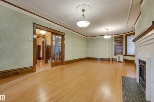 10317 Villa Avenue, Edmonton, AB - Indoor Photo Showing Other Room With Fireplace