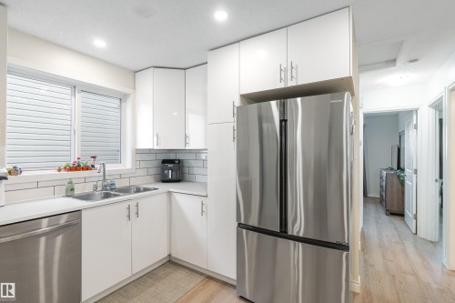 4134 51 Street, Gibbons, AB - Indoor Photo Showing Kitchen With Stainless Steel Kitchen With Double Sink