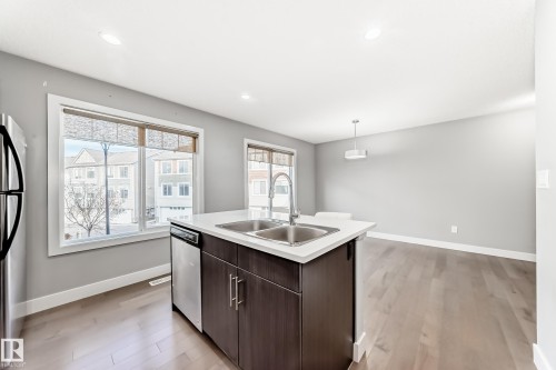 23 2922 Maple Way, Edmonton, AB - Indoor Photo Showing Kitchen With Double Sink