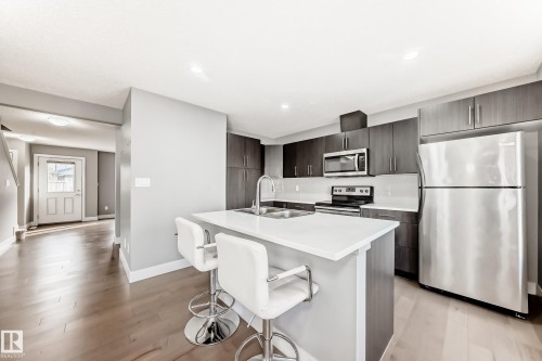 23 2922 Maple Way, Edmonton, AB - Indoor Photo Showing Kitchen With Stainless Steel Kitchen With Double Sink