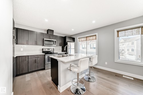 23 2922 Maple Way, Edmonton, AB - Indoor Photo Showing Kitchen With Stainless Steel Kitchen With Double Sink