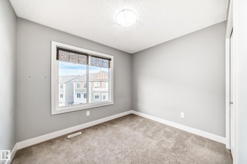 23 2922 Maple Way, Edmonton, AB - Indoor Photo Showing Other Room