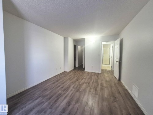201 164 Bridgeport Boulevard, Leduc, AB - Indoor Photo Showing Other Room
