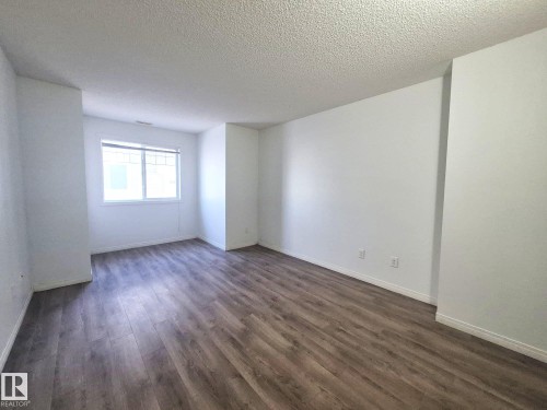 201 164 Bridgeport Boulevard, Leduc, AB - Indoor Photo Showing Other Room