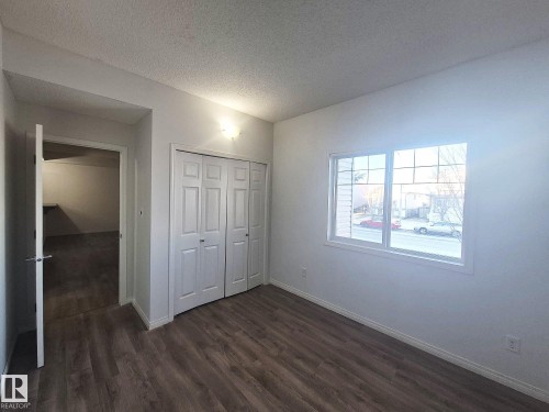 201 164 Bridgeport Boulevard, Leduc, AB - Indoor Photo Showing Other Room