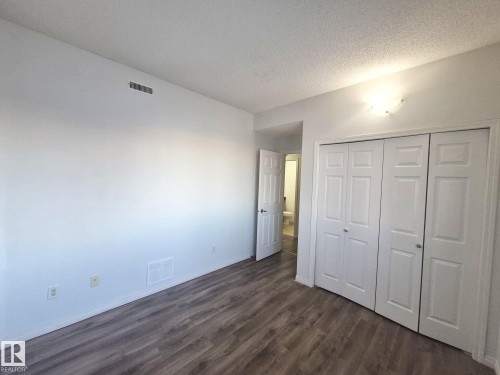201 164 Bridgeport Boulevard, Leduc, AB - Indoor Photo Showing Other Room