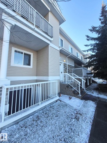 201 164 Bridgeport Boulevard, Leduc, AB - Outdoor With Deck Patio Veranda