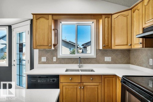 6144 165 Avenue, Edmonton, AB - Indoor Photo Showing Kitchen With Double Sink