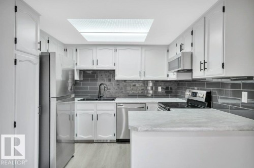 13618 27 Street Nw, Edmonton, AB - Indoor Photo Showing Kitchen With Double Sink With Upgraded Kitchen