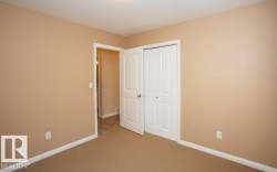 Unfurnished bedroom featuring a closet and carpet floors - 