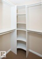 Spacious closet with carpet flooring - 