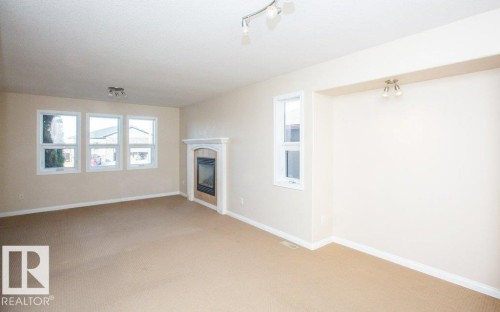 11107 103 Street, Westlock, AB - Indoor Photo Showing Other Room With Fireplace