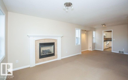 11107 103 Street, Westlock, AB - Indoor Photo Showing Living Room With Fireplace