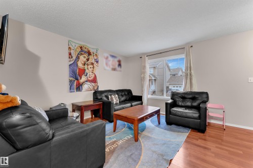 8 2503 24 Street, Edmonton, AB - Indoor Photo Showing Living Room