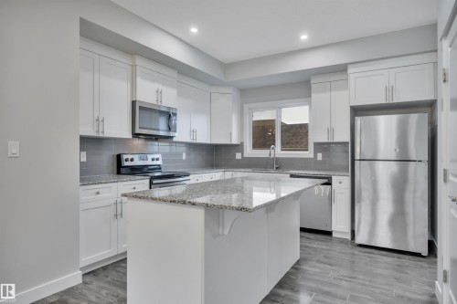 169 Robinson Drive, Leduc, AB - Indoor Photo Showing Kitchen With Stainless Steel Kitchen With Upgraded Kitchen