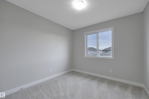 169 Robinson Drive, Leduc, AB - Indoor Photo Showing Other Room