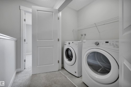 169 Robinson Drive, Leduc, AB - Indoor Photo Showing Laundry Room
