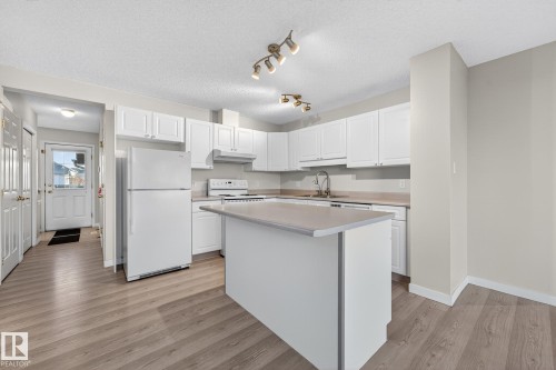 1094 Barnes Way, Edmonton, AB - Indoor Photo Showing Kitchen With Double Sink