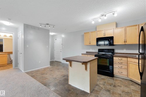 111 5951 165 Avenue, Edmonton, AB - Indoor Photo Showing Kitchen