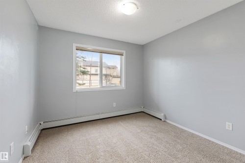111 5951 165 Avenue, Edmonton, AB - Indoor Photo Showing Other Room