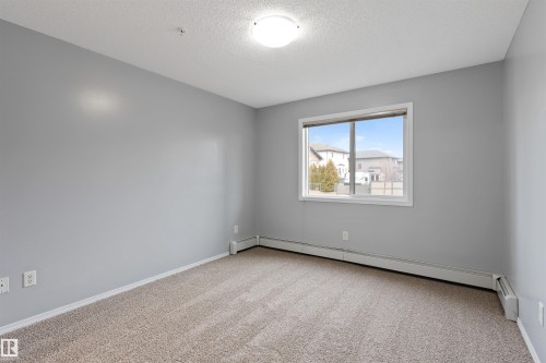 111 5951 165 Avenue, Edmonton, AB - Indoor Photo Showing Other Room