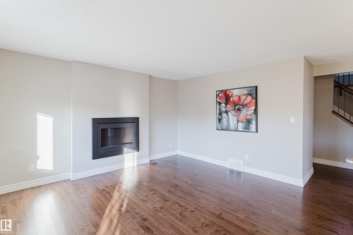 16730 122A Street, Edmonton, AB - Indoor Photo Showing Living Room With Fireplace