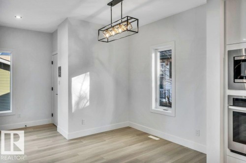 9907 68 Street, Edmonton, AB - Indoor Photo Showing Other Room With Fireplace
