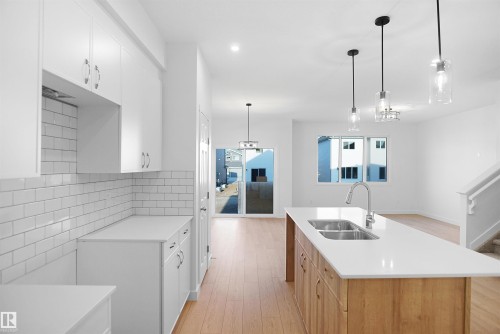 17333 6A Street, Edmonton, AB - Indoor Photo Showing Kitchen With Double Sink With Upgraded Kitchen