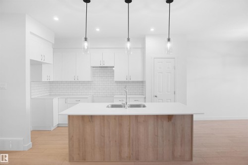 17333 6A Street, Edmonton, AB - Indoor Photo Showing Kitchen With Double Sink With Upgraded Kitchen
