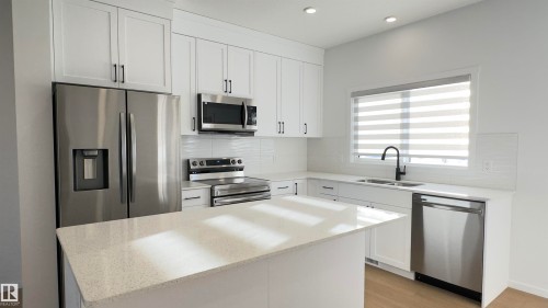 2251 Alces Drive, Edmonton, AB - Indoor Photo Showing Kitchen With Double Sink With Upgraded Kitchen