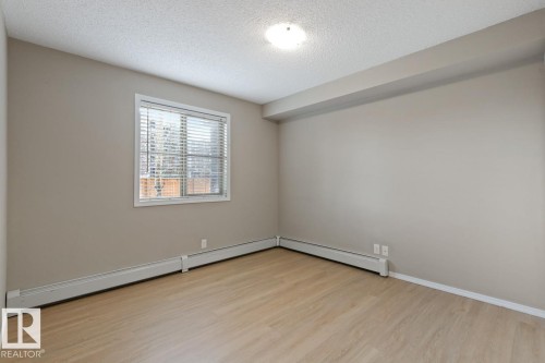 110 12035 22 Avenue Sw, Edmonton, AB - Indoor Photo Showing Other Room