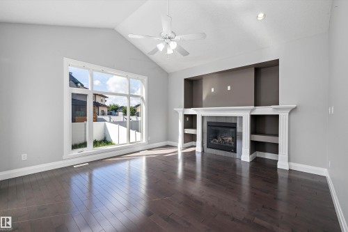 550 Albany Way, Edmonton, AB - Indoor Photo Showing Other Room With Fireplace